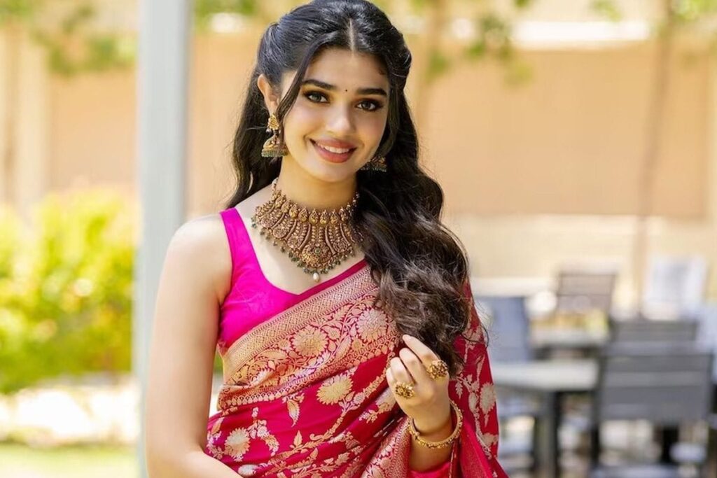 Actress Krithi Shetty Serves Regal Elegance In A Magenta-pink Banarasi Saree