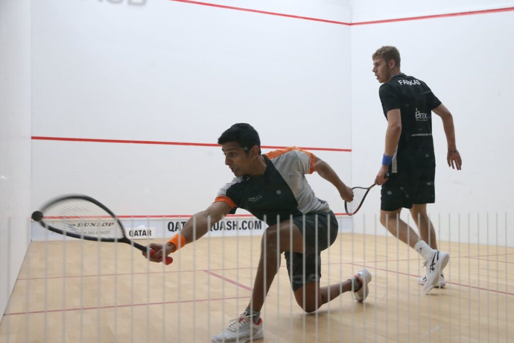 Saurav Ghosal and Ramit Tandon Reach Second Round of Qatar Classic Squash Championship