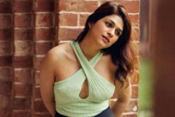 Actress Shraddha Das Raises Temperatures In Green Criss-cross Halter Neck Top