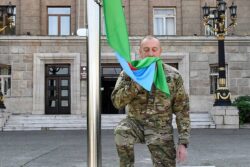 Azerbaijan's President Raises the Nation's Flag in a Former Breakaway Region's Capital