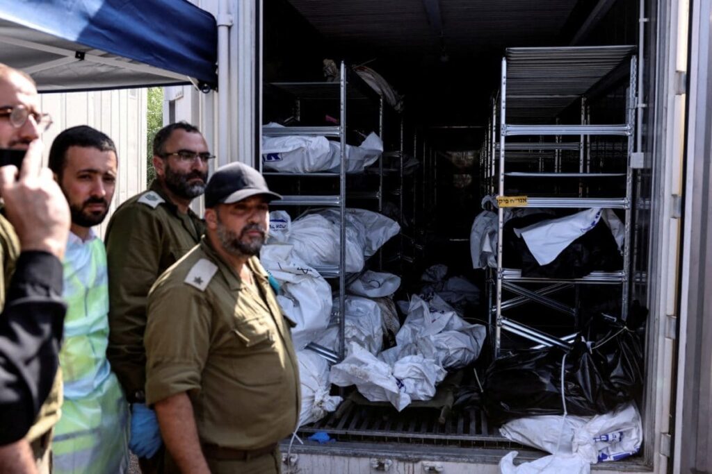 ‘Impossible to Identify’: Rescuers Stack Bodies of Israelis Killed by Hamas in Outdoor Containers