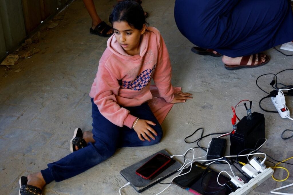 Social Media Giants Caught in Gaza War over Content, Face Fury from Both Israeli, Palestinian Sites