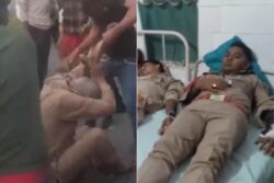 WATCH | Mob Rains Kicks, Punches & Batons on UP Cop, Some Snatch Police Rifles