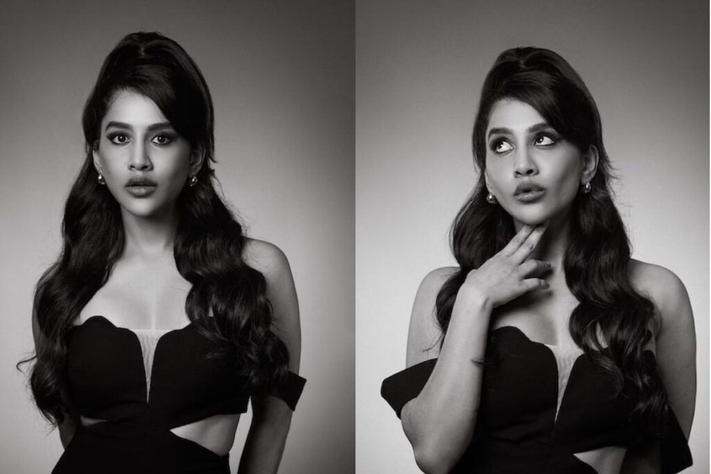 Actress Nabha Natesh Oozes Oomph In Short Off-shoulder Black Dress