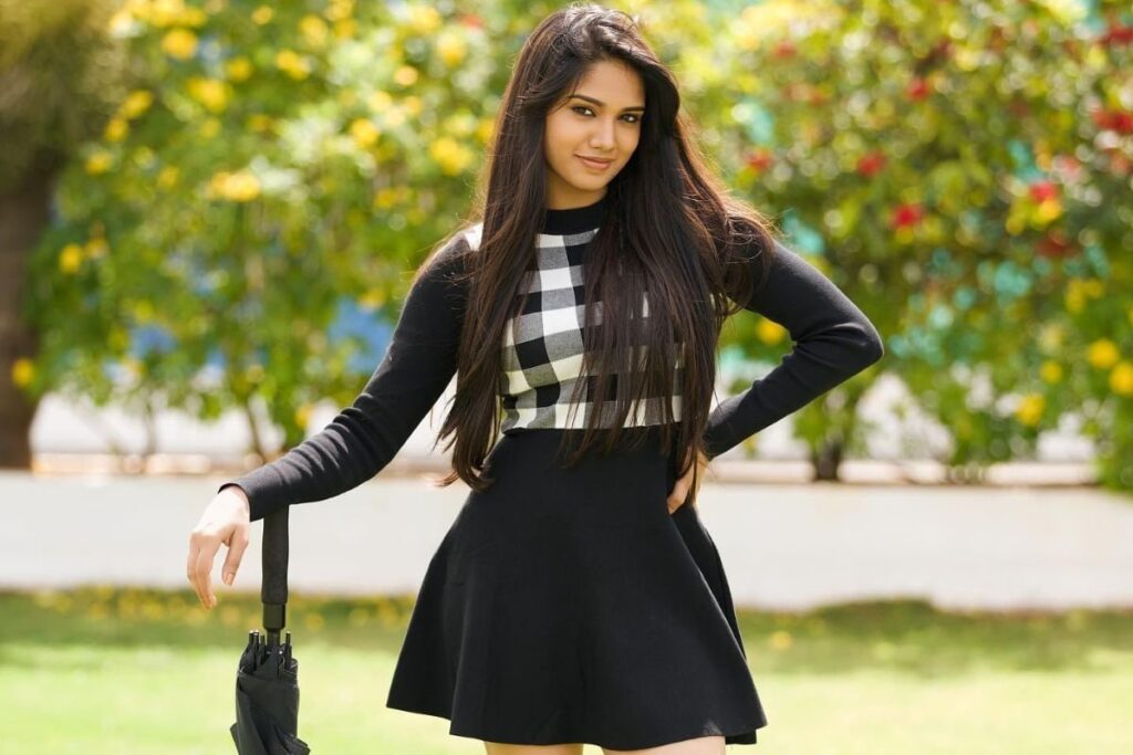 Actress Keerthi Krishna Is Elegance Personified In Black Sweater And Skirt