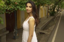 Actress Meenaakshi Chaudhary Raises Temperatures In Sleeveless White Dress