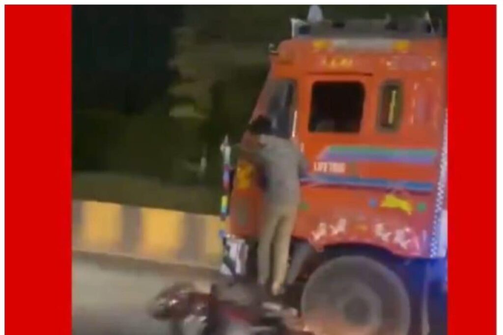 Hyderabad Man Hangs On Side Of Speeding Truck As Vehicle Drags His Two-Wheeler Underneath | WATCH