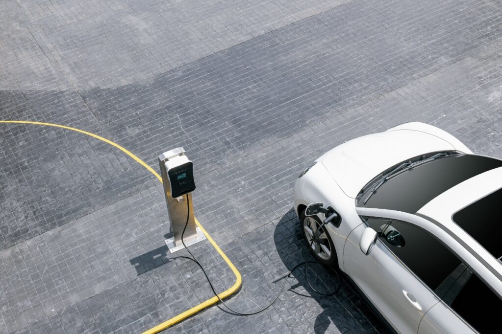 Why UP Leads in EV Sales, but Karnataka Tops in Charging Stations: Contrast in Development & Demand