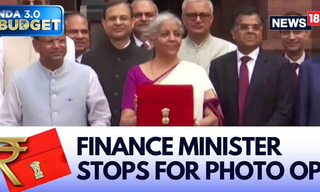 Delhi: Finance Minister Nirmala Sitharaman With Her Team For The Photo Op. | English News | News18