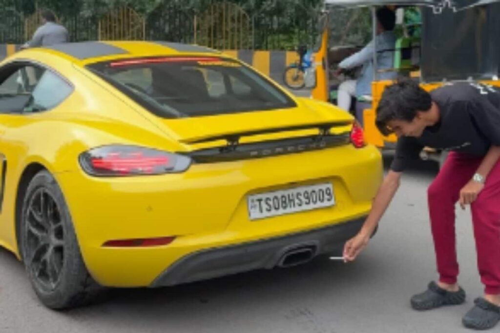 Man Tries To Light Cigarette With Porsche's Exhaust, Burns Hand | Video