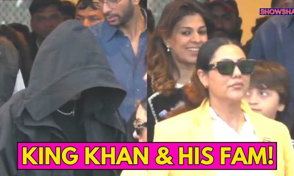 Shah Rukh Khan Hides His Face Under A Hoodie As He Arrives In Jamnagar With His Family | WATCH