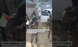Hamas Parades Israeli Female Soldier On Stage Before Release