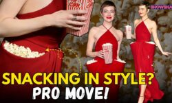 Emma Stone Stuffs Her Louis Vuitton Gown With Popcorn, Eats As She Poses At SNL50 Event | DECODED