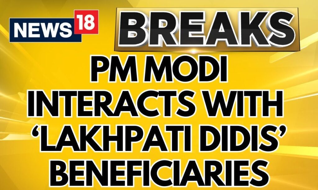 PM Modi News | PM Modi Interacts With Lakhpati Didis At Navsari, Gujarat | Women's Day | News18