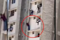 Criminal Climbs 5th-Floor Ledge, Livestreams Dramatic Standoff With Gujarat Cops | Video