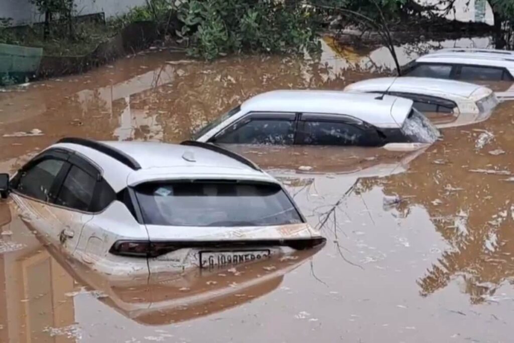 Heavy Rainfall Floods Roads In Gujarat's Himmatnagar, Cars Go Underwater | Video